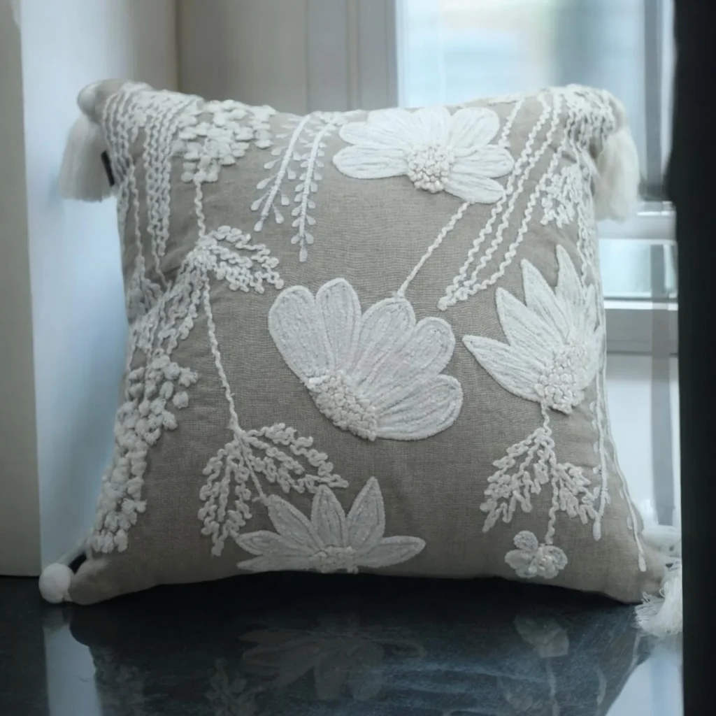 Boho theme chic beige white greige sofa cushion cover for that light look available at Opulent Decor 